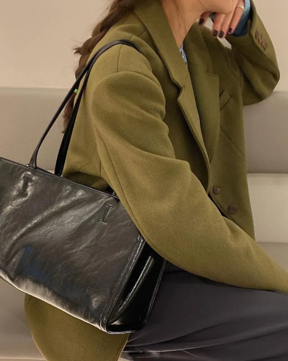 Lapeled single-breasted loose woolen jacket