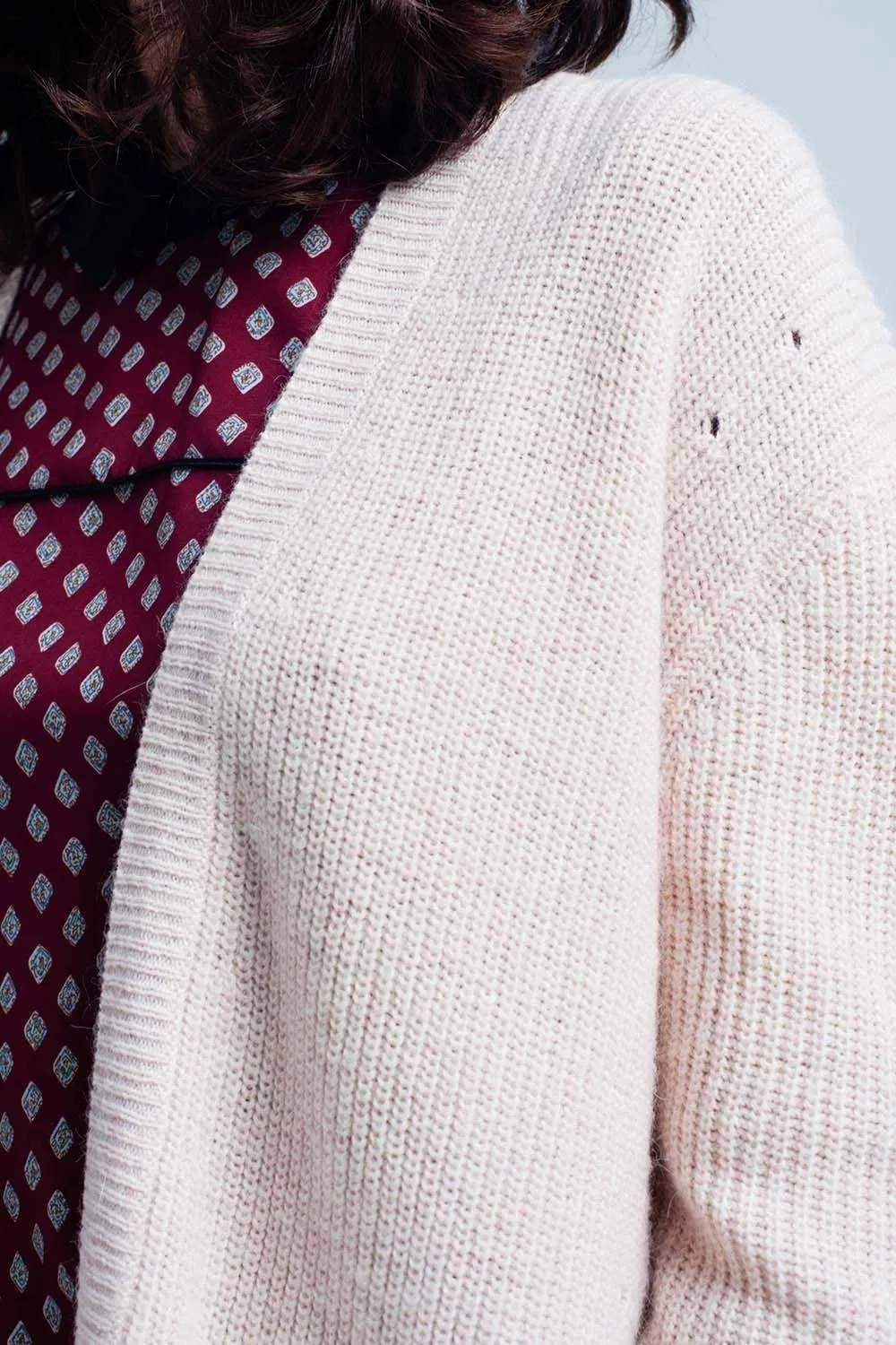 Pink angora cardigan with long sleeves